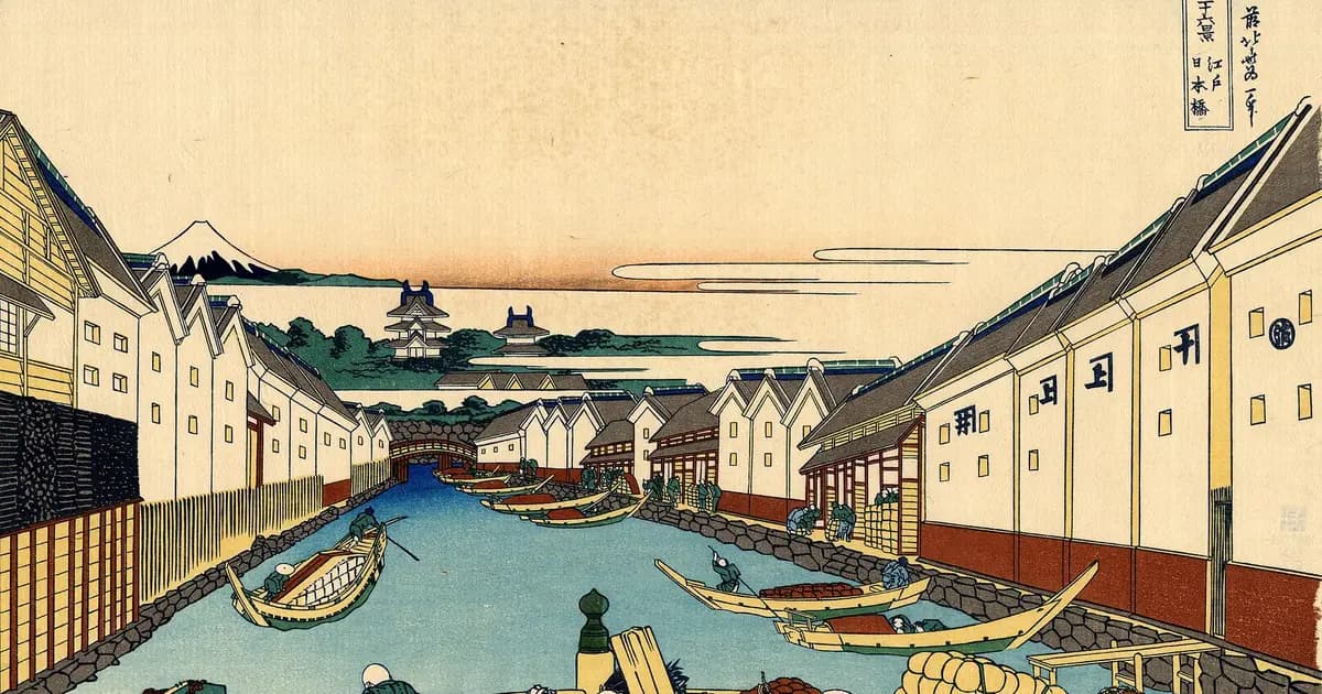 Hokusai's print of Nihonbashi bridge in Edo crowded with people, a tiny Mount Fuji in the distance.