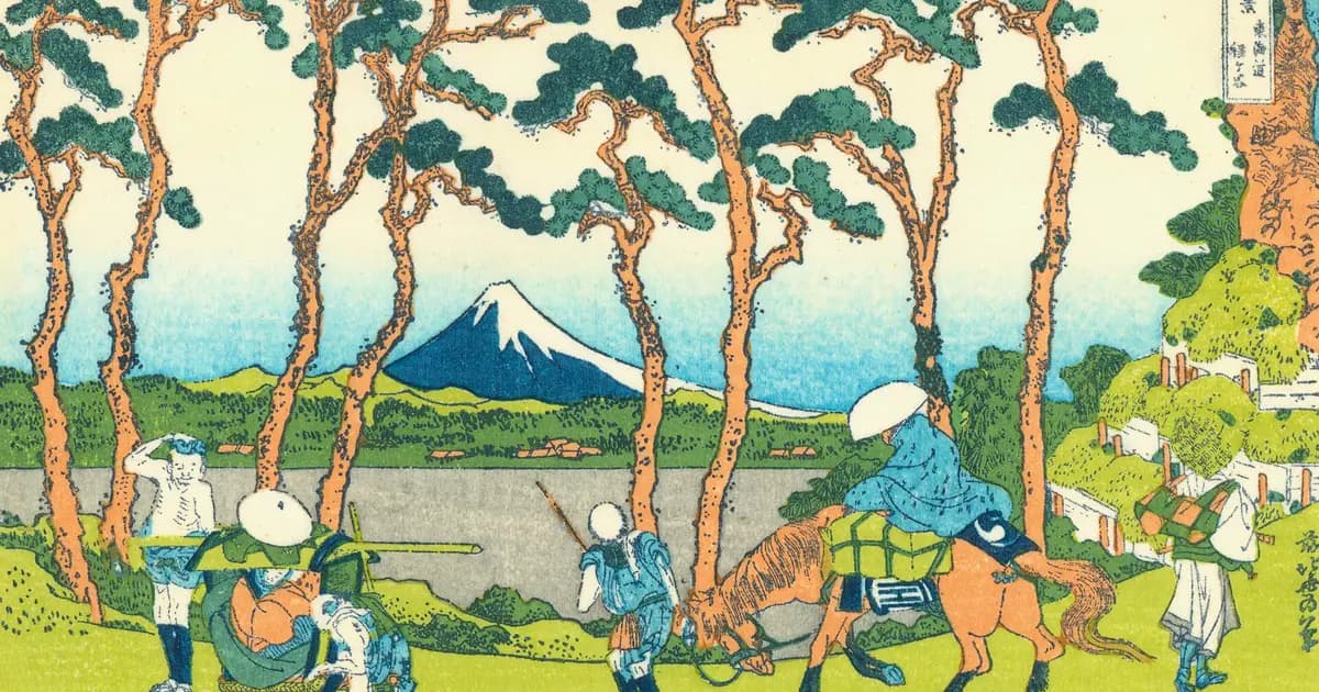 Hokusai's print of Hodogaya on the Tokaido road: travellers, palanquin bearers and a packhorse passing a row of pines, Fuji glimpsed between the trunks.